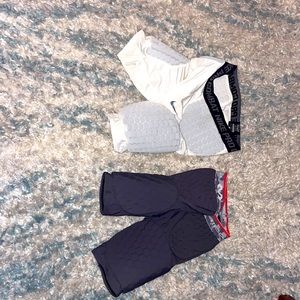 2 football/basketball girdles